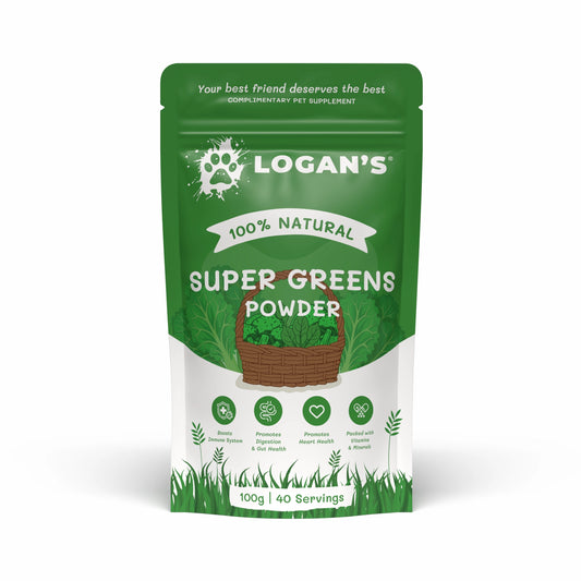 A green stand-up pouch of Logan's Super Greens Powder pet supplement, featuring a white banner and illustrations of green leaves and a basket of greens on a white background.
